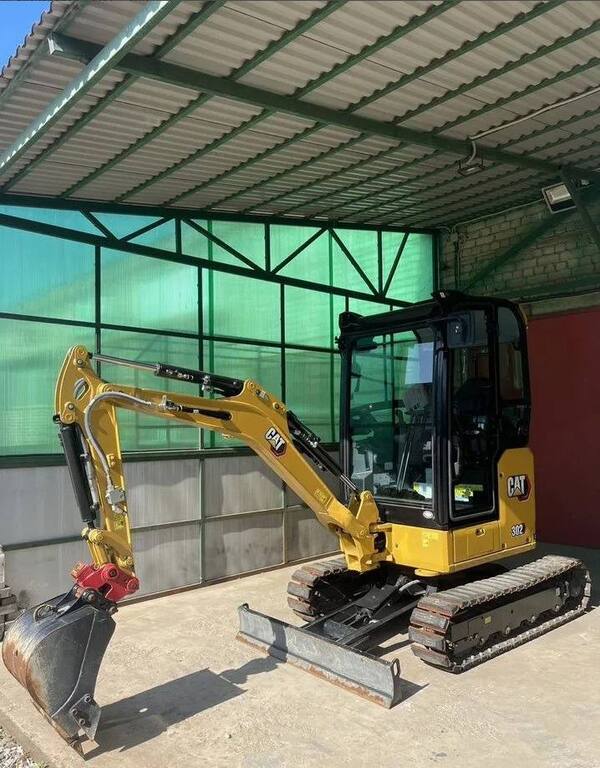 Мини-экскаватор Cat302